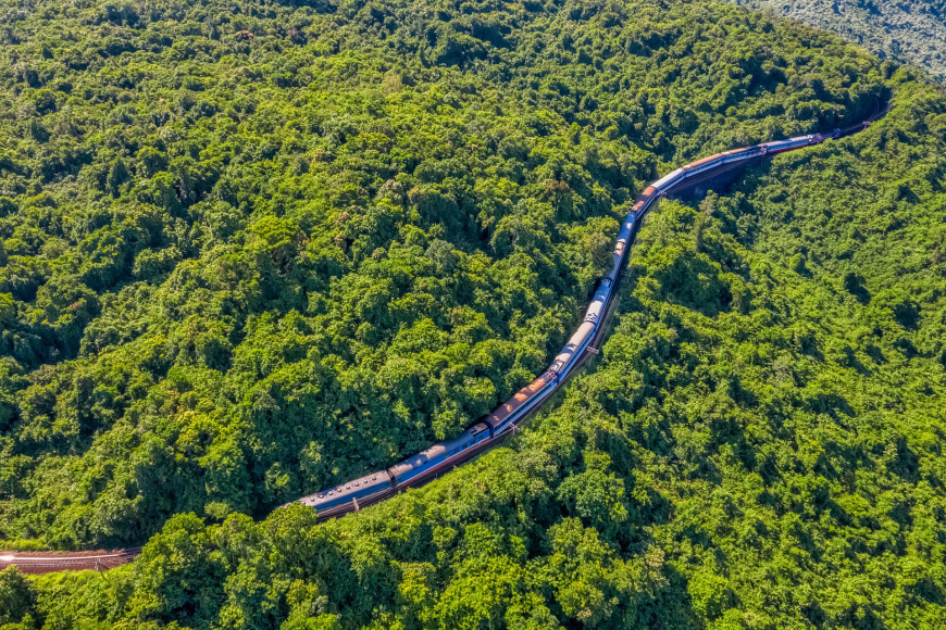 Train going through forest in central Vietnam